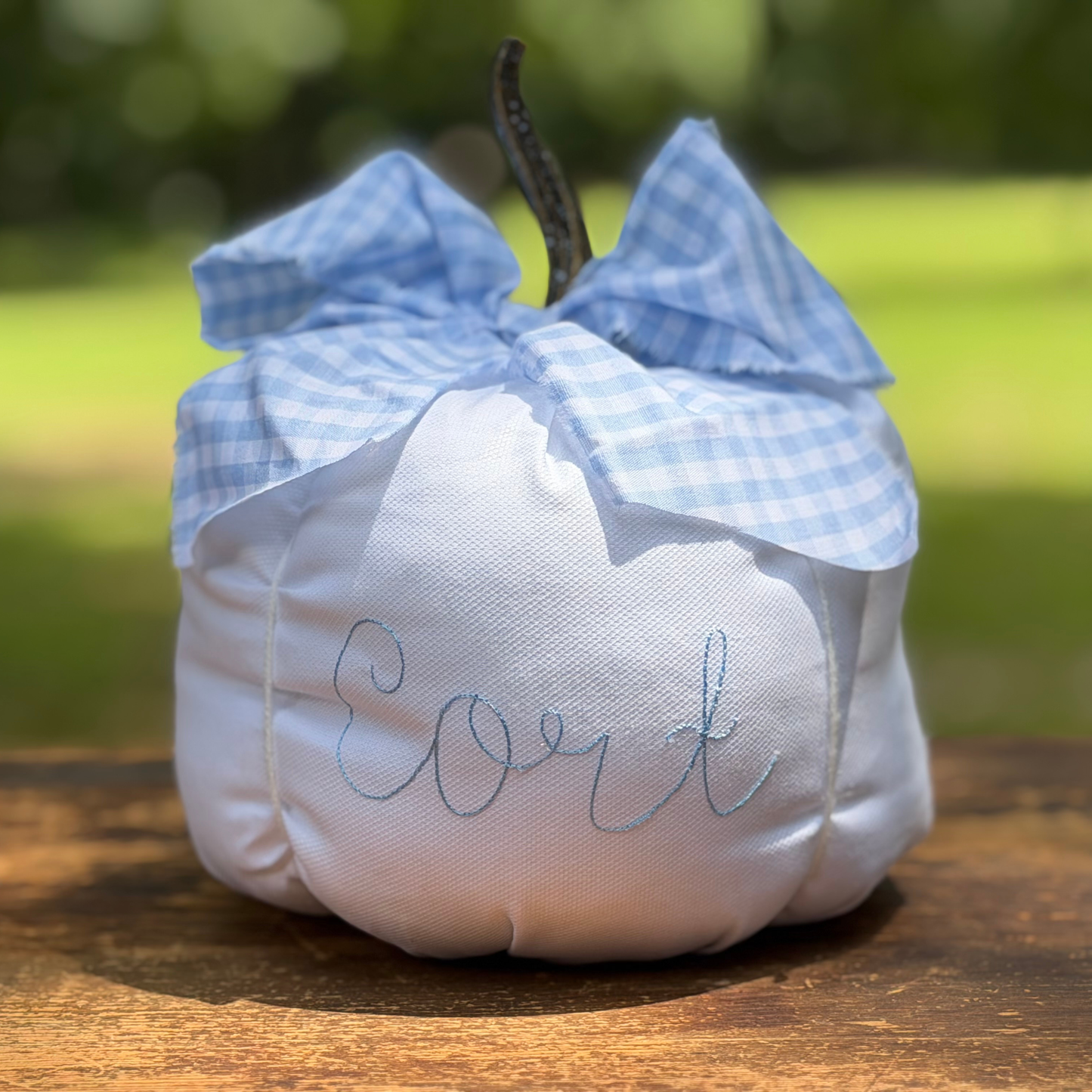 Personalized gingham bow pumpkin with blue cotton bow and embroidered name