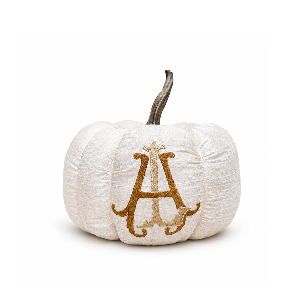 Monroe ivory silk personalized pumpkin with layered gold monogram centered on a white background