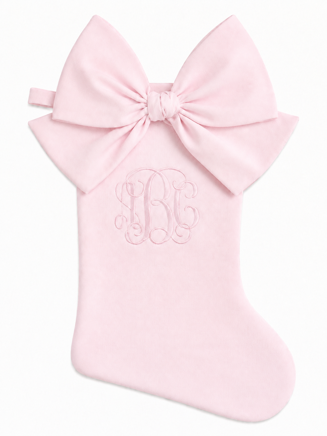 Personalized baby pink cotton piqué Christmas stocking shown without a bow or cuff
